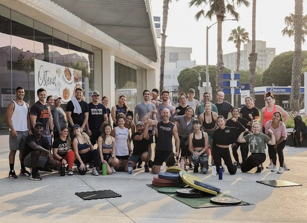 Jacob with his gym community after an outdoor workout